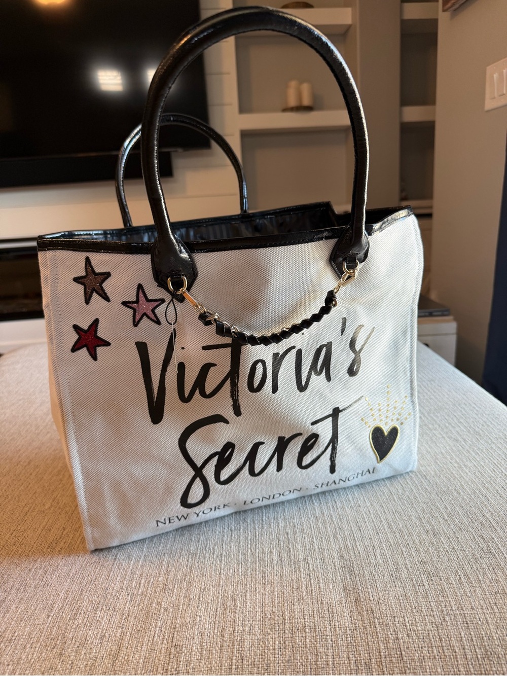 Victoria's Secret Cream Canvas Tote with Black Handles and Star Accents